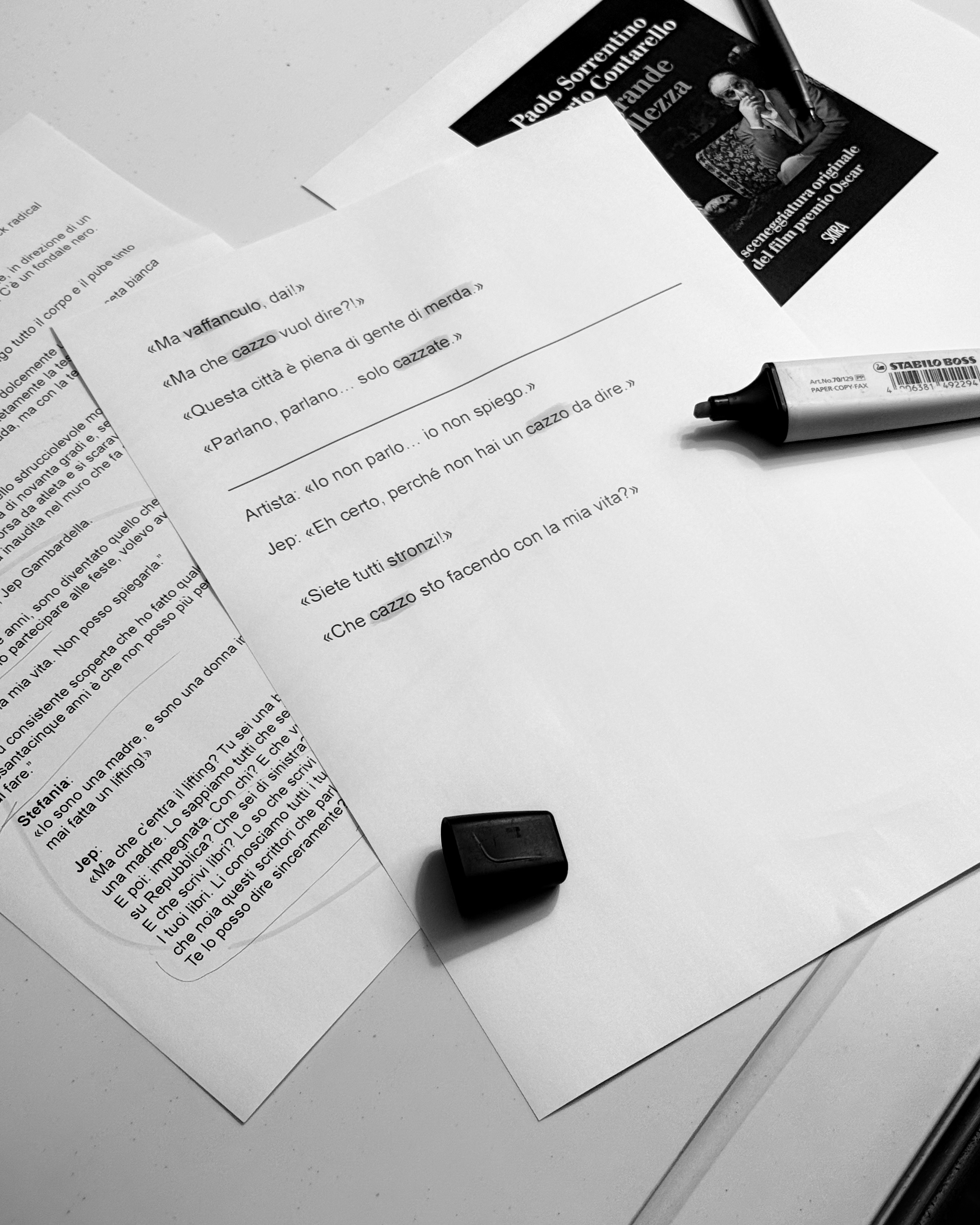 Close-up photography of a film script with marked translation discrepancies. Research materials for Eduard Surzhyk's project 'Linguistic Loss'. The work explores how subtitles and dubbing act as a filter that rewrites the author's original intent in cinema.